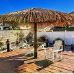 Example: 13ft Palmex Palapa with 3' table, Canyon Brown Stain & stand 