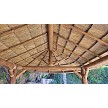 Example: Underside 12x24 African Reed Tiki Hut. Options shown: Canyon Brown stain, Fire Retardant Treatment, Decorative Rope Accents 