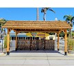 Example: African Reed Tiki Hut Gable Roof. Cedar Stain, Palapa Stands, Rope Kit, 