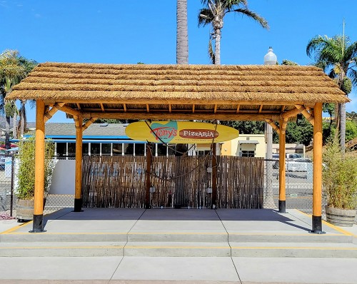 Example: African Reed Tiki Hut Gable Roof. Cedar Stain, Palapa Stands, Rope Kit, 
