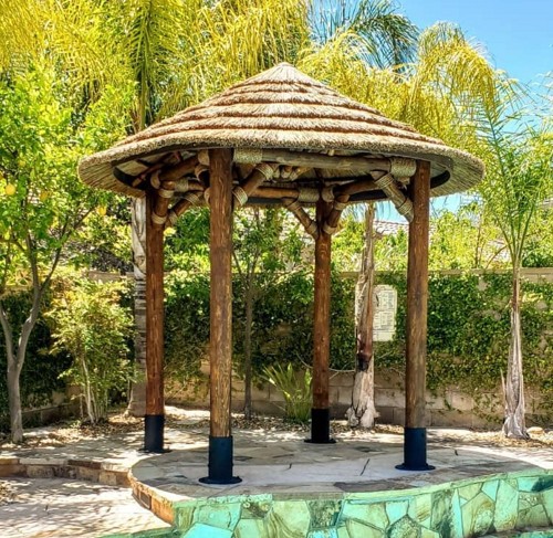 Example: 10.5 ft African Reed Tiki Hut/ Palapa, Options: Canyon Brown stain, Palapa stand, Rope Kit. 