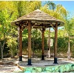 Example: 10.5 ft African Reed Tiki Hut/ Palapa, Options: Canyon Brown stain, Palapa stand, Rope Kit. 